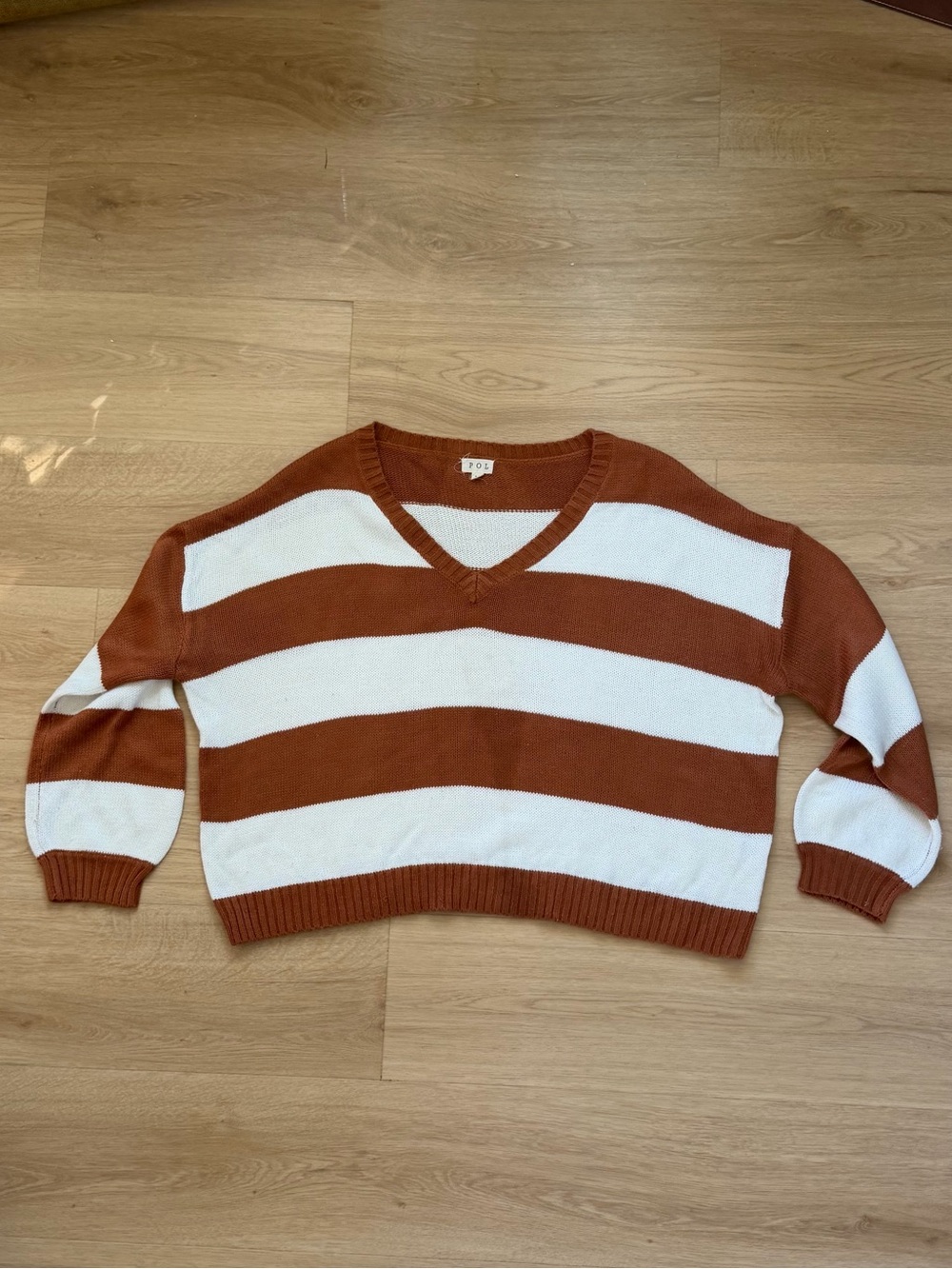 POL Women's Striped V-Neck Sweater in Rust and White